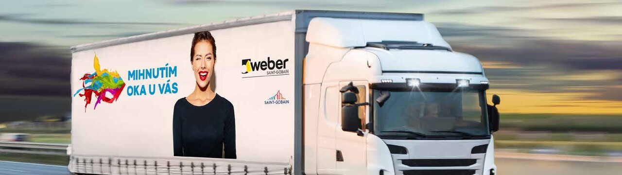 mihnutím oka u vás.jpg biely Weber kamión idúci po diaľnici