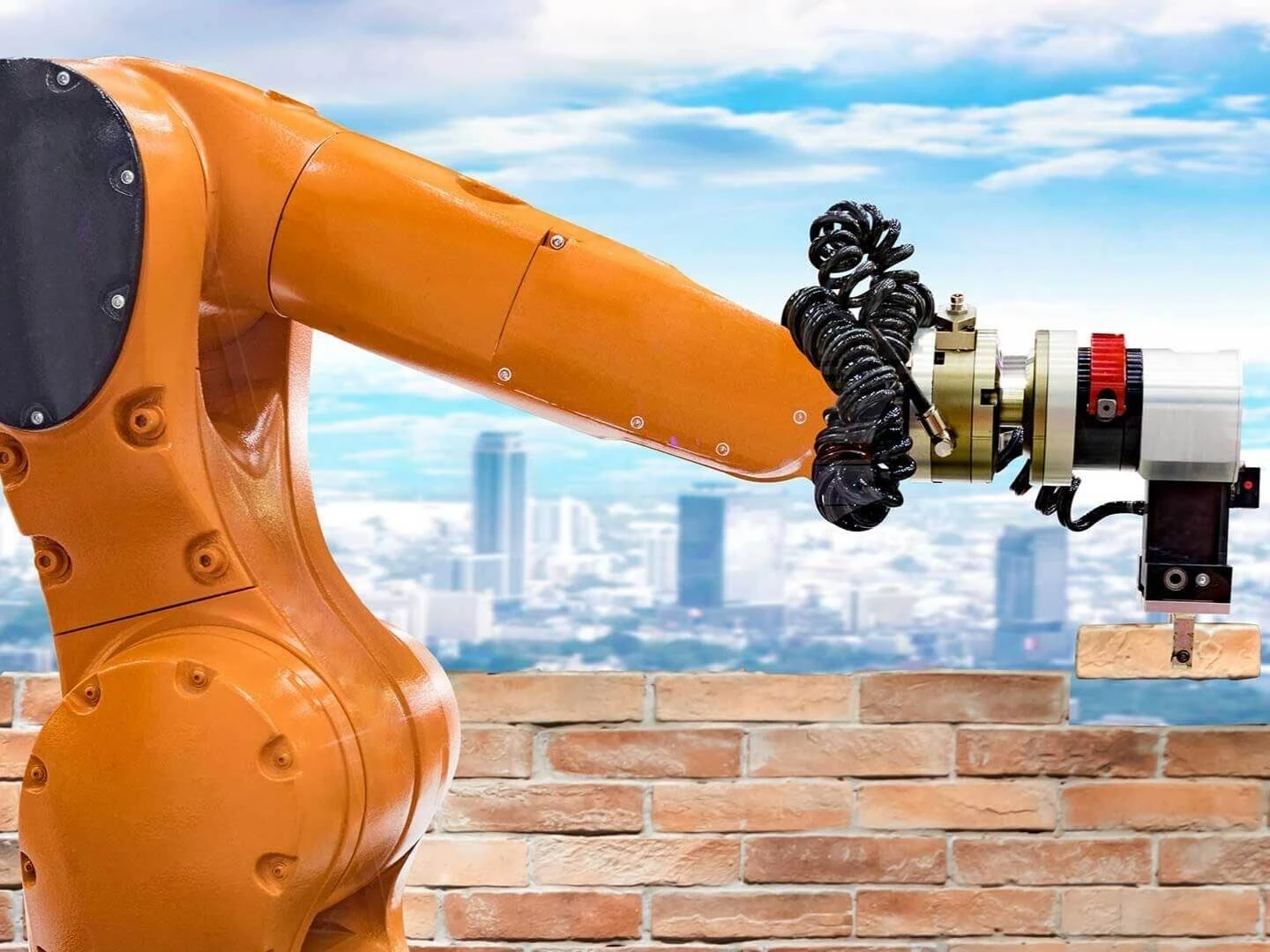 Robotické rameno ukladá tehly