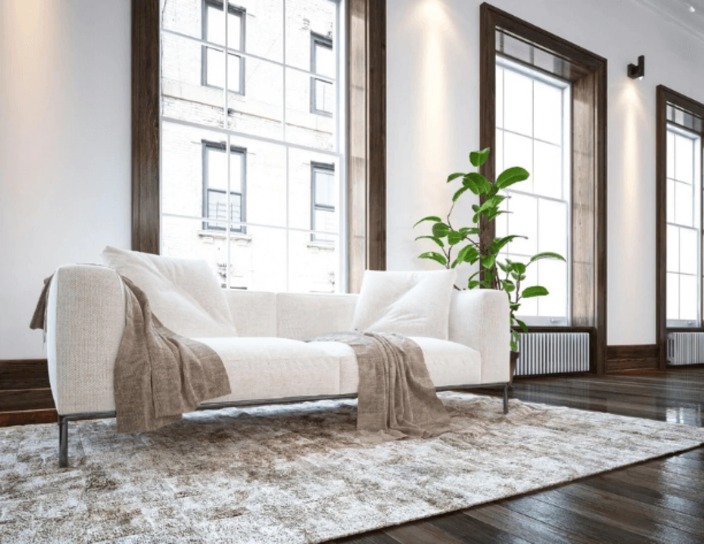 Presvetlená obývačka vďaka veľkým oknám.