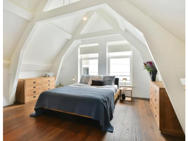 Útulná spálňa v podkroví.